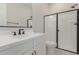 Clean bathroom with single vanity, toilet, and shower at 20230 W Hollyhock St, Buckeye, AZ 85396