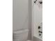 Bathroom with toilet and bathtub, featuring updated fixtures at 20230 W Hollyhock St, Buckeye, AZ 85396