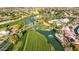 Aerial view of community golf course, clubhouse, and pool at 9824 W Kerry Ln, Peoria, AZ 85382