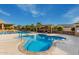Relaxing community spa and pool area with a covered patio and comfortable seating at 9824 W Kerry Ln, Peoria, AZ 85382