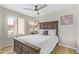 Spacious bedroom with large window and wood flooring at 9824 W Kerry Ln, Peoria, AZ 85382