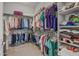 Large walk-in closet with ample shelving and hanging space at 26568 W Cat Balue Dr, Buckeye, AZ 85396