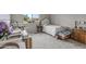 Charming bedroom with double bed and wood dresser at 26568 W Cat Balue Dr, Buckeye, AZ 85396
