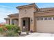 One-story home with a two-car garage and attractive landscaping at 26568 W Cat Balue Dr, Buckeye, AZ 85396