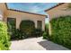 Private courtyard with lush landscaping and stone tile flooring at 3965 E Sierra Vista Dr, Paradise Valley, AZ 85253