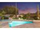 Stunning pool and spa at night with landscape lighting at 3965 E Sierra Vista Dr, Paradise Valley, AZ 85253