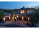 Stunning two-story home with Spanish-style architecture and lighting at 3965 E Sierra Vista Dr, Paradise Valley, AZ 85253