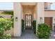 Elegant entryway with a custom wood door and stone flooring at 3965 E Sierra Vista Dr, Paradise Valley, AZ 85253