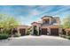 Stunning two-story home with a three-car garage and manicured landscaping at 3965 E Sierra Vista Dr, Paradise Valley, AZ 85253