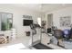 Well-equipped home gym featuring treadmill, stationary bike, and weights at 3965 E Sierra Vista Dr, Paradise Valley, AZ 85253