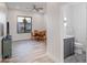Small dining area with table and chairs, adjacent to powder room at 11905 N 83Rd Pl, Scottsdale, AZ 85260