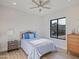 Bright bedroom with ceiling fan and window seat at 11905 N 83Rd Pl, Scottsdale, AZ 85260