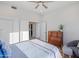 Bright bedroom with a dresser and comfortable seating at 11905 N 83Rd Pl, Scottsdale, AZ 85260