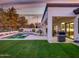 Relaxing pool area with outdoor kitchen and seating at 11905 N 83Rd Pl, Scottsdale, AZ 85260