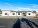 Modern home exterior with stone accents at 11905 N 83Rd Pl, Scottsdale, AZ 85260