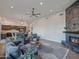 Spacious living room with a fireplace and open floor plan at 11905 N 83Rd Pl, Scottsdale, AZ 85260