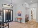 Bright entryway with modern console table and kitchen views at 11905 N 83Rd Pl, Scottsdale, AZ 85260