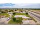 Aerial view of a house with a large backyard and surrounding area at 25843 W Northern Lights Way, Buckeye, AZ 85326