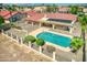 Single story home with a private pool and large backyard, offering plenty of outdoor space at 2119 N Lake Shore Dr, Casa Grande, AZ 85122