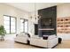 Open living room with a striking marble fireplace and comfortable seating at 0 N Marchant Trace --, Queen Creek, AZ 85144