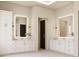 Luxurious bathroom with double vanities, a large mirror, and plenty of cabinet space at 0 N Marchant Trace --, Queen Creek, AZ 85144