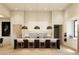 Modern kitchen with large island and high ceilings at 0 N Marchant Trace --, Queen Creek, AZ 85144