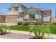 Two-story home with a large garage and attractive landscaping at 3314 E Azalea Dr, Gilbert, AZ 85298