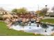 Community features a tranquil pond with a wooden footbridge at 3314 E Azalea Dr, Gilbert, AZ 85298