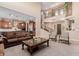 Spacious living room with high ceilings and a view into the kitchen at 3314 E Azalea Dr, Gilbert, AZ 85298