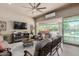 Bright Gathering room with sliding doors that open to a covered patio and pool at 3314 E Azalea Dr, Gilbert, AZ 85298