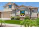 Two-story home with a large garage and attractive landscaping at 3314 E Azalea Dr, Gilbert, AZ 85298