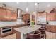 Kitchen boasts an island and stainless steel appliances at 3314 E Azalea Dr, Gilbert, AZ 85298