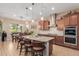 Gourmet kitchen with island, stainless steel appliances, and granite countertops at 3314 E Azalea Dr, Gilbert, AZ 85298