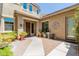 Inviting courtyard entry with brick pavers and potted plants at 3314 E Azalea Dr, Gilbert, AZ 85298