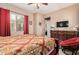 Comfortable bedroom with king bed and a separate sitting area at 3314 E Azalea Dr, Gilbert, AZ 85298