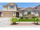 Two-story home with a large garage and attractive landscaping at 3314 E Azalea Dr, Gilbert, AZ 85298