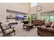 Living room features a fireplace and large TV at 3314 E Azalea Dr, Gilbert, AZ 85298