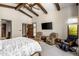 Spacious main bedroom with sitting area and large windows at 18826 N 101St Pl # 10, Scottsdale, AZ 85255