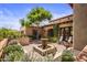 Relaxing courtyard patio with fountain and seating area at 18826 N 101St Pl # 10, Scottsdale, AZ 85255