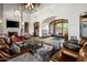Spacious living room with fireplace and large windows at 18826 N 101St Pl # 10, Scottsdale, AZ 85255