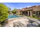 Resort-style pool and spa with expansive patio and house views at 18826 N 101St Pl # 10, Scottsdale, AZ 85255