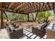 Relaxing patio with fire pit and pergola at 18826 N 101St Pl # 10, Scottsdale, AZ 85255