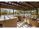 Stainless steel outdoor kitchen under pergola at 18826 N 101St Pl # 10, Scottsdale, AZ 85255
