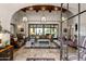 Spacious living room with high ceilings and large windows at 18826 N 101St Pl # 10, Scottsdale, AZ 85255