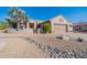 Single story home with desert landscaping and two-car garage at 20419 N Shadow Mountain Dr, Surprise, AZ 85374