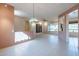 Bright dining area with tiled floors and a chandelier at 20419 N Shadow Mountain Dr, Surprise, AZ 85374