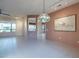 Spacious dining area with tile floor and large window at 20419 N Shadow Mountain Dr, Surprise, AZ 85374