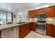 Modern kitchen with granite countertops and stainless steel appliances at 20419 N Shadow Mountain Dr, Surprise, AZ 85374