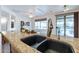 Granite countertop kitchen island with double sink at 20419 N Shadow Mountain Dr, Surprise, AZ 85374