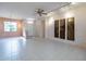 Bright and spacious living room with tile flooring and neutral walls at 20419 N Shadow Mountain Dr, Surprise, AZ 85374